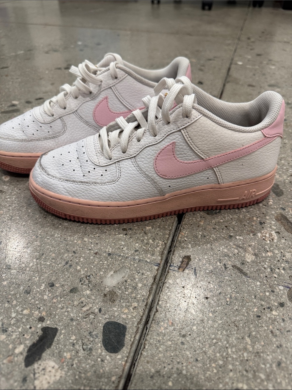 Nike Air Force 1 Kids White Sneakers with Pink Swoosh and Pink Sole